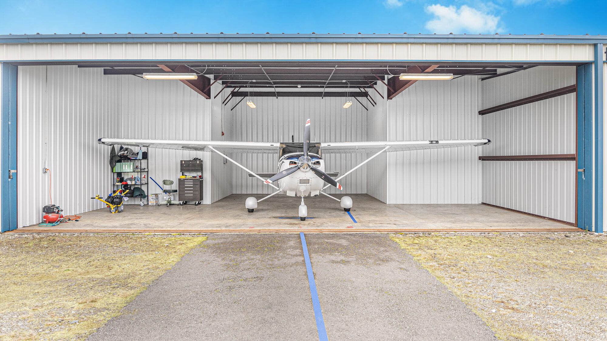Cessna Turbo Skylane parked inside an open hangar
